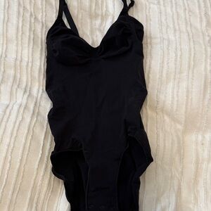 Skims body suit size large